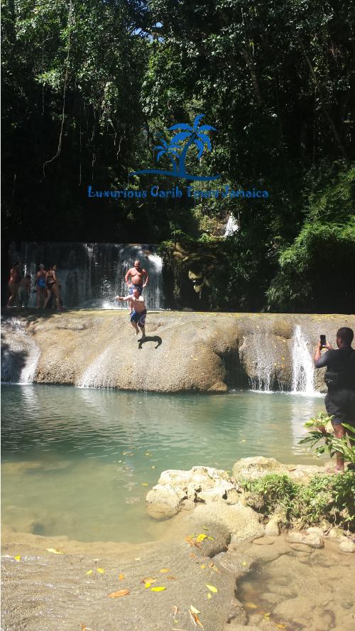 Name:  Jumping at YS Falls LCTJ.jpg
Views: 302
Size:  98.9 KB