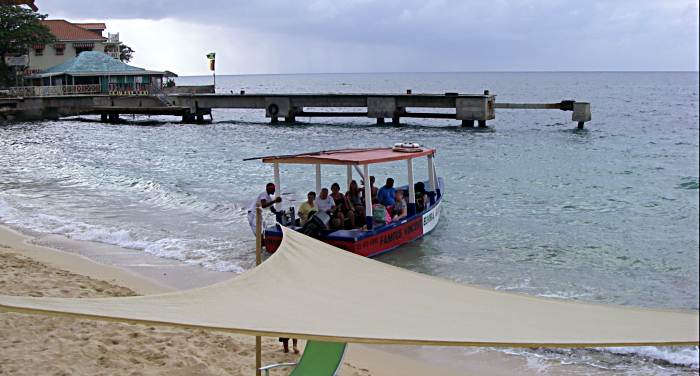 Arriving By Boat at Canoe in Negril Jamaica